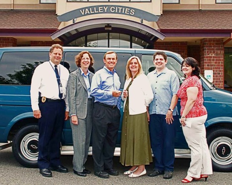 King County recently donated a retired Metro Van to Valley Cities Counseling and Consultation. Appearing at the ceremony were: from left