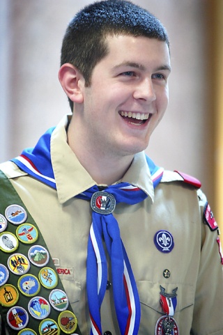 Troop 401’s Alex Johnson breaks into a smile during his Eagle Scout ceremony last Saturday.