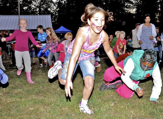 Kids scramble in the Haunted Duck Hunt at the City of Auburn's S'mores More Than You Imagine event at Game Farm Wilderness Park last Saturday. The unique outdoor event included live music and storytelling by a bon fire.