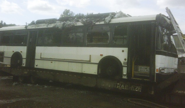 A man suffered burn injuries following a bus fire at a salvage business in Pacific on Thursday.