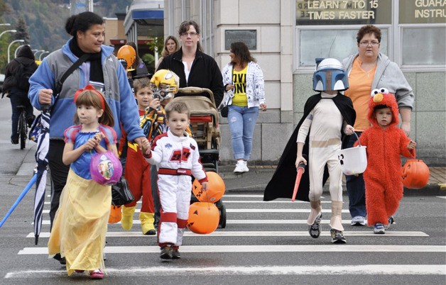 Trick-or-treaters take to Auburn's Main Street during last weekend's Halloween Festival.