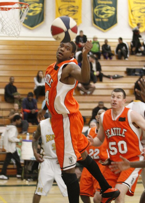 Mountaineer forward Jacob Manning leaps for a rebound.