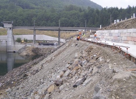 Workers build a drilling platform on the right abutment at Howard Hanson Dam. The Corps is working to make repairs at the dam.