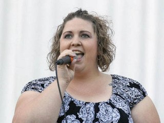 Pacific resident and Auburn native Dayla Walker seized the top prize in the adult category during the Auburn On Stage! singing competition last Friday at Les Gove Park.