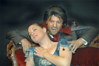 Sydney Lanier stars as Lucy and Phil Edwards as the blood-sucking count in the Auburn Regional Theatre Company’s production of ‘Dracula.’