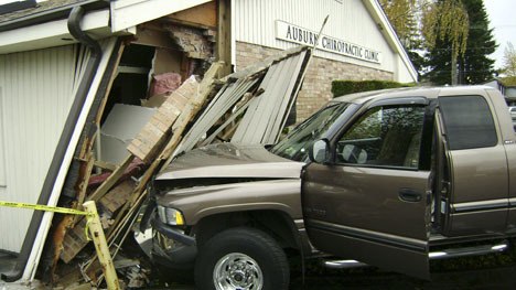 The Auburn Chiropractic Clinic suffered damage on Friday morning after a man suffering a medical emergency drove his pickup truck into the southwest corner of the building on Auburn Way South.