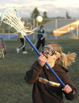 Lacrosse is a fast-paced sport that's catching on with Auburn-area high school girls as the district club continues to grow.