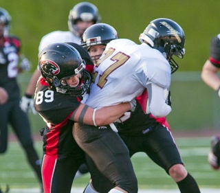 The Majestics’ Gretchen Pietras (89) takes down a Portland runner during the teams’ May 9 matchup in Kent. Seattle blew out Portland