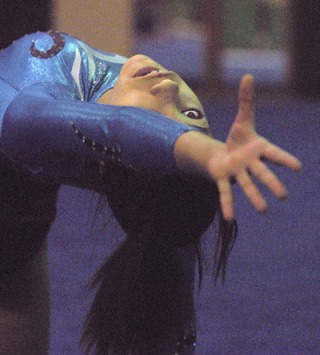 Auburn Riveside's Tanika Stensen performs in the floor exercise.