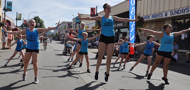 The Auburn Dance Academy performs in the AugustFest parade down Main Street on Saturday.