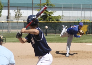 Junior Brandon Williams pitches in Auburn Mountainview’s first postseason game against Mount Rainier at Russell Road Fields in Kent.