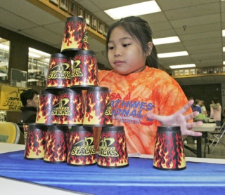 Gabby Rivera of Dick Scobee Elementary placed second in the preliminary round and first in the final for her age group at the recent Northwest Regional Sports Stacking Championships at Auburn High School. A field of 260 competitors converged on the gym to compete for quick times and top awards.