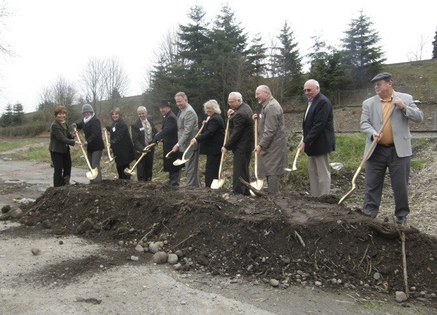 City leaders and some of its funding partners on the M Street project participate in Tuesday's groundbreaking ceremony.