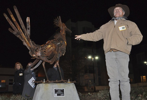 Sculptor Dan Klennert presents his metal Roadrunner. Klennert’s piece is one of seven outdoor sculptures that will be displayed throughout the year in Auburn’s new Downtown Sculpture Gallery.