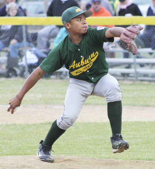 Isaiah Hatch takes aim at the strike zone during Auburn’s 3-2 victory over Mercer Island in the state Little League championship at Elma.