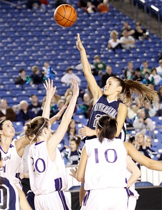 Auburn Riverside senior Nichole Jackson elevates for a shot against Issaquah this past week at the Washington State 4A girls basketball championships. Auburn Riverside defeated Issaquah 48-57 to capture fourth-place.