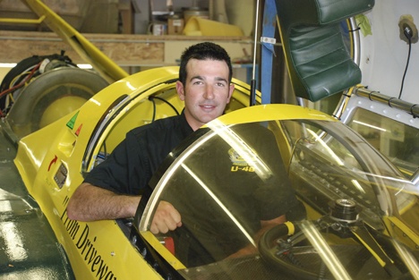 Brian Perkins behind in the cockpit of the U-48 Miss Lakeridge Paving hydro.