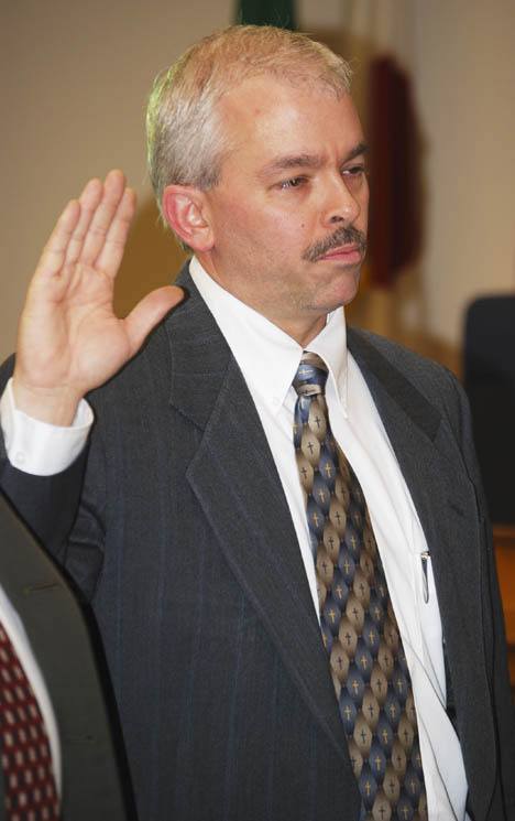 John Partridge is sworn in as the newest member of the Auburn City Council.