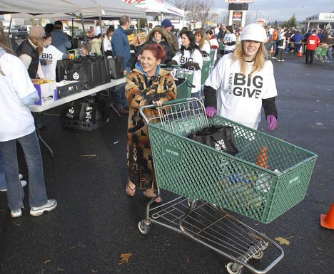 Hundreds of people in the Auburn community were supplied food for their Thanksgiving at the Big Give in the TOP Foods parking lot last year.