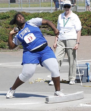 Christi Ometu puts the shot for the Auburn Mountainview Lions track-and-field team. Ometu finished in sixth-place in the shot put and was 16th in the discus.