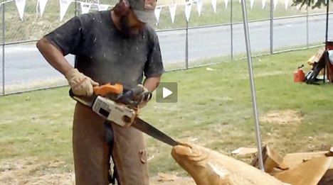 A competitor carves out a creation at the Pacific Chainsaw Carving Competition.
