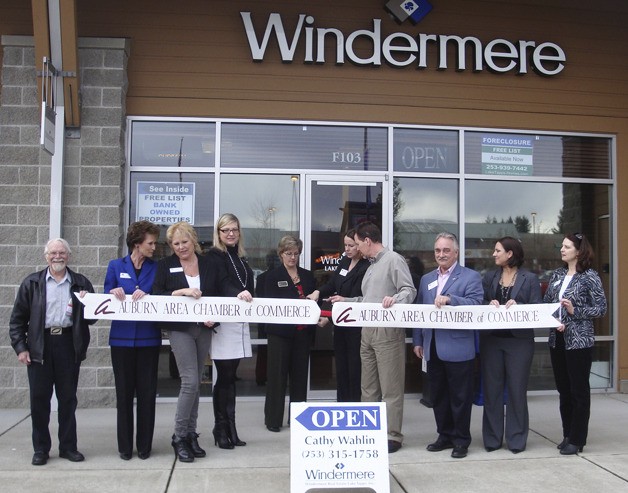 Chamber and business representatives welcome Windermere Real Estate to Lakeland Hills.