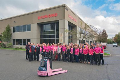 Raymond Handling Concepts Corporation employees gave to the pink pallet jack project.