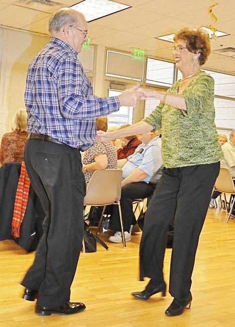 Patricia Goelzer and Les Williams dance to the Buddy Holly music.
