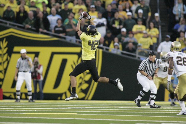 Oregon tight end David Paulson leaps to haul in a pass during the Ducks’ 60-13 thrashing of UCLA on Oct. 21. Paulson