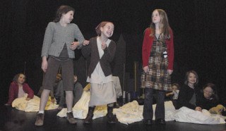 Rehearsing for ‘Annie Jr.’ at the Auburn Avenue Theater are from the left: Emma Zucati as ‘Duffy