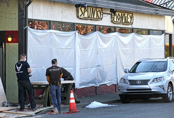 Workers prepare new fixtures for Auburn's Spunky Monkey