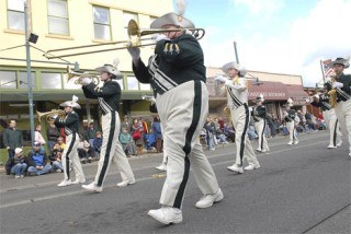 The Auburn High School marching band performs during last year's parade on Main Street.