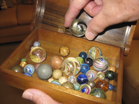 Luis Lucero’s large collection includes a variety of handmade German marbles of many sizes and colors. Lucero has been adding to his collection for a few years.