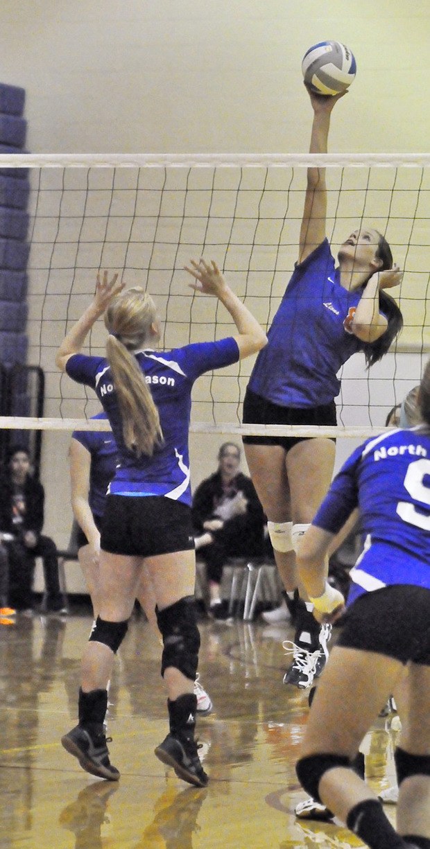 Auburn Mountainview's Ali Davenport hits the ball against North Mason.