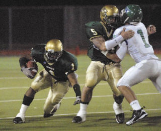 Junior Chris Young takes advantage of a Jeff Gouveia block to gain some yards against Woodinville last Friday.
