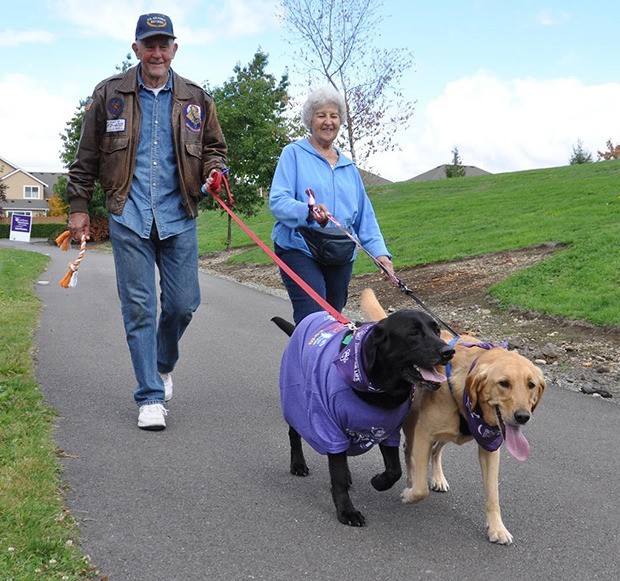 Cancer survivor Skip Welles with his dog