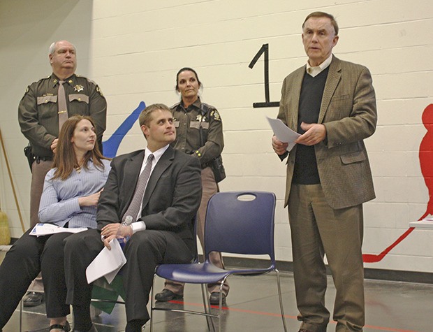 King County Councilmember von Reichbauer speaks to constituents at an identification theft town hall at Valhalla Elementary School in South King County on Tuesday night. From left are: Capt. Greg Thomas King County Sheriff’s Office; Rose Torgerson Washington Coalition of Crime Victim Advocates; Peter Lewicki