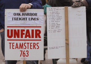 Union workers picketed outside Oak Harbor Freight Lines headquarters for five months. The streets were quiet Friday as the Auburn-based freight company and the union agreed to end the strike.