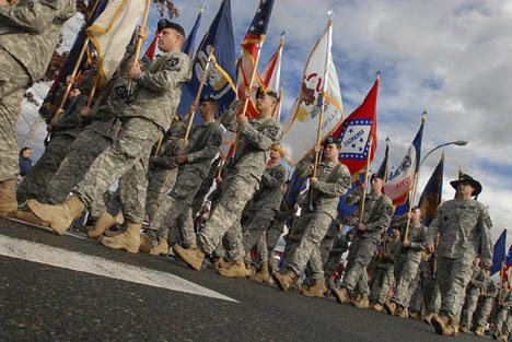 The U.S. Army State and Territorial Flag Marching Unit marches during last year's parade.