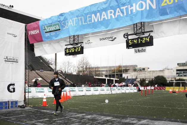 Algona's Peter Phan crosses the finish line at Seattle Memorial Stadium on Sunday.