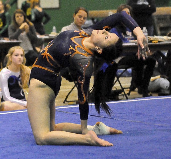 Auburn Mountainview senior Hanna Houck performs in the floor exercise at the Auburn All-City meet.