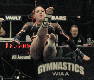 Senior Ashley Perkovich performs in the floor exercise during this past Saturday’s Washington State 3A gymnastics championships.