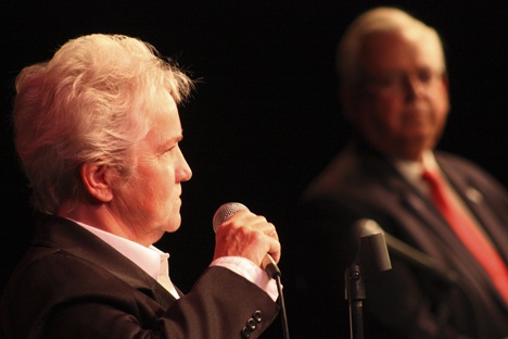 Challenger Virginia Haugen fields a question as Mayor Pete Lewis waits to reply during last week’s debate.