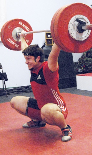 Auburn's Dave Rief is hoisting lofty totals as he continues to climb the weightlifting ranks.
