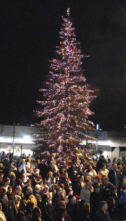 An Auburn tradition: A large crowd gathers in the plaza in front of Auburn City Hall to sing Christmas carols and watch the lighting of the tree.
