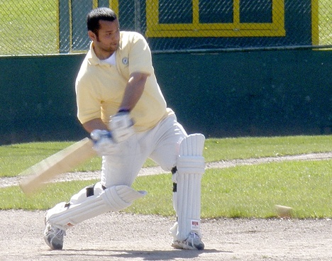 Usman Mohammad takes his turn at bat during a Green River Community College cricket practice. The college now boasts a cricket club team