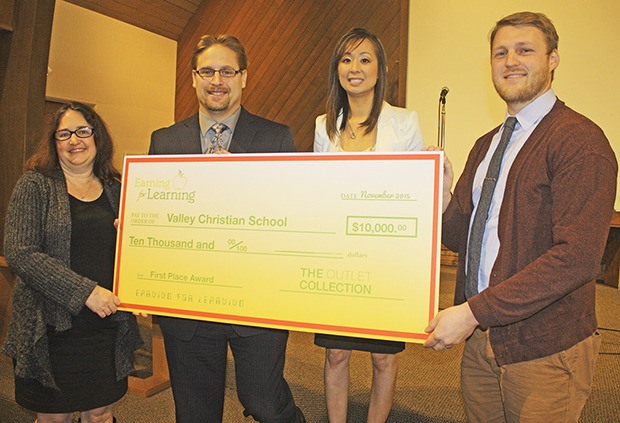 The Outlet Collection presents Valley Christian School with a $10