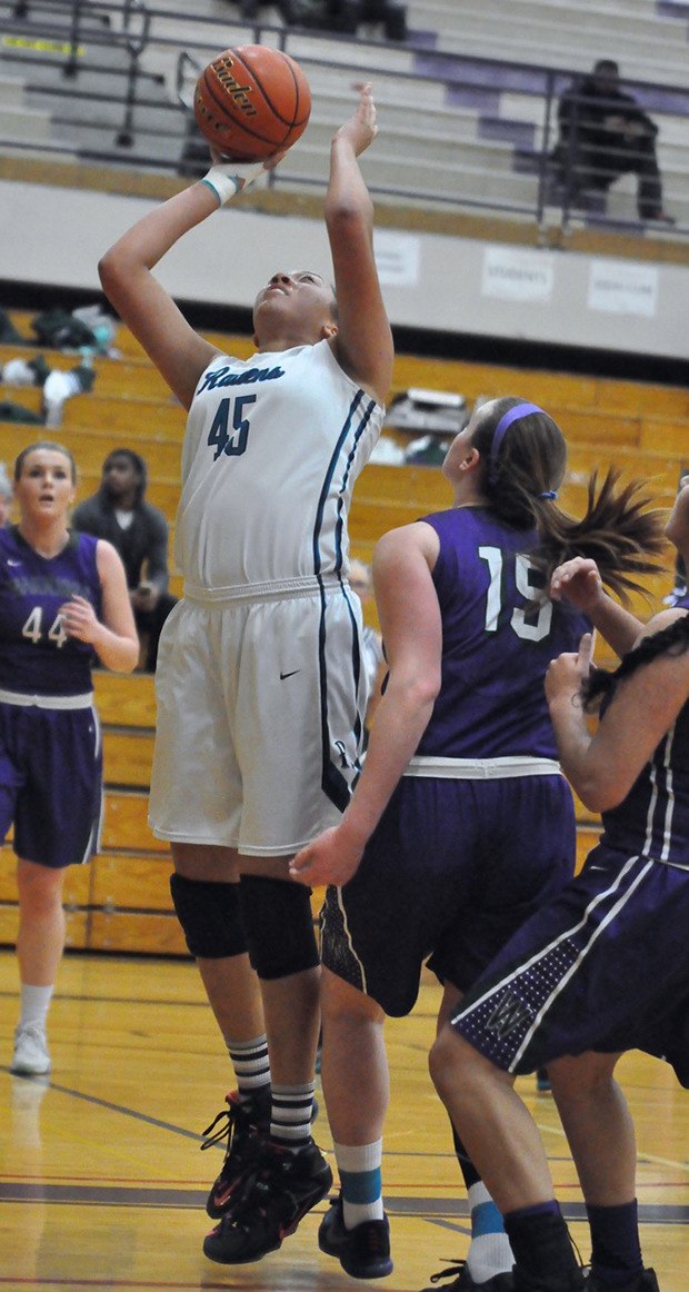 Auburn Riverside's Faith Turner goes up for a shot during the Ravens' 58-48 state regional playoff loss to Edmonds-Woodway.