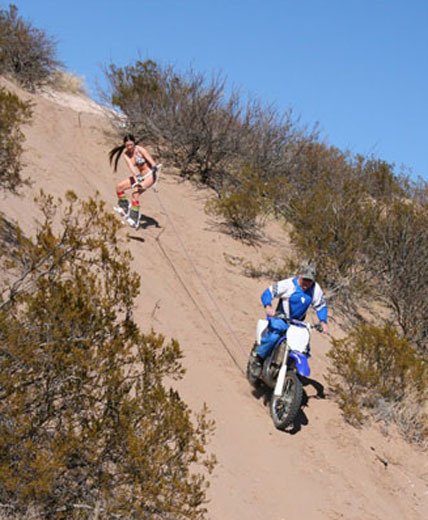 Brandy Rogers' winning joyride took her snowboarding down a sand dune behind a motorcycle.