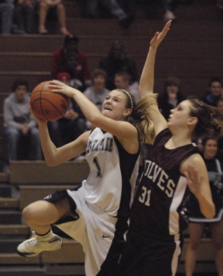 Auburn Riverside's Mercedes Wetmore drives against South Kitsap. Wetmore had a game-high 18 points in the contest.